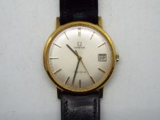 A lady's gold-plated Omega wristwatch, 29mm silvered dial signed Omega, Geneva, Swiss made,