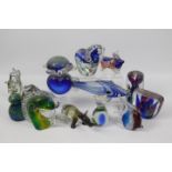A collection of paperweights and glassware to include two aquarium paperweights.