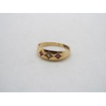 A mid-purity yellow metal, stone set ring, stamped 15, size M+½ (resized and slightly misshapen),