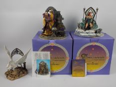 Three Spellbound figures by Tudor Mint, two contained in original boxes.