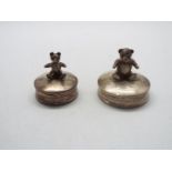 Two silver pill boxes, each with teddy bear finials, 34.5 grams.