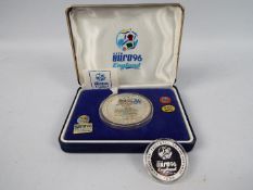 Two UEFA Euro 96 commemorative coins / medallions struck by Liberty Mint in .