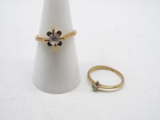 Two 9ct gold stone set rings, one size L, the other size O, 3.4 grams all in.