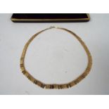 A 9ct gold Italian necklace, 42 cm (l), with Birmingham assay import mark, approximately 8 grams.