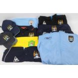 Manchester City Football Club - A collection of Manchester City branded clothing, hats, shirts,