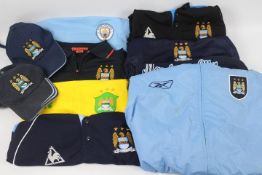 Manchester City Football Club - A collection of Manchester City branded clothing, hats, shirts,