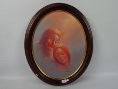 Keith English - An oval framed oil on board depicting a clown and a lady, signed lower right,