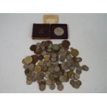 A collection of UK and foreign coins, Victorian and later, some silver content.
