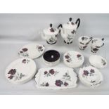 Royal Albert - A collection of tea wares in the Masquerade pattern, approximately 38 pieces.