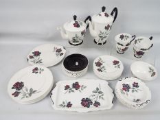Royal Albert - A collection of tea wares in the Masquerade pattern, approximately 38 pieces.