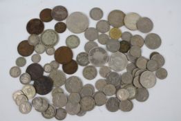 A collection of UK pre-decimal coins, predominantly 3d, 6d, 1/=,
