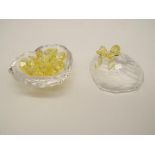 Swarovski Crystal - a Lidded Trinket Box containing a quantity of yellow tinted heart-shaped