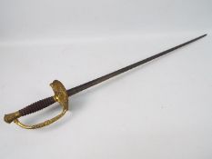 A 1796 pattern spadroon, brass hilt and 80 cm double edged blade,