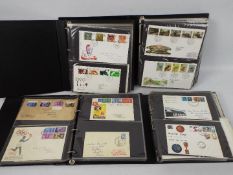 Philately - Four albums of First Day Covers, one containing covers dating between 1948 and 1968,