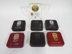 England Rugby Union - A collection of official commemorative medals / medallions from the 2003