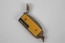 An early to mid 20th century novelty vesta case in the form of a penknife.