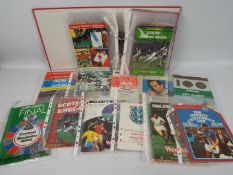 A binder of 1970's and later programmes to include internationals, cup finals,