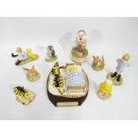 A collection of boxed Royal Doulton figures from the Winnie The Pooh Collection to include WP22,