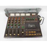 Tascam - Portastudio 244 - 4-track cassette recorder and 4-channel mixer in one portable unit,