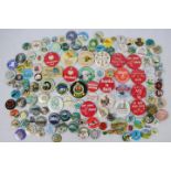 A collection of vintage pin badges, predominantly tourist destinations, towns,