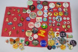 A collection of vintage pin badges relating to theatre / television / film / comics to include The