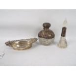 Two silver mounted, cut glass scent bottles, one London assay,