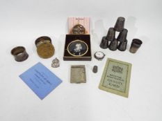 Mixed collectables to include a silver ARP badge and ephemera, silver napkin ring and thimble,