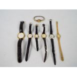 A collection of wrist watches including a 9ct gold cased lady's watch.