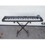 Cheetah MK7VA Midi Keyboard with stand and power supply.