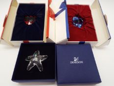 Swarovski Crystal - a Red Heart SCS crystal, a Blue Heart crystal and a White star shaped crystal,