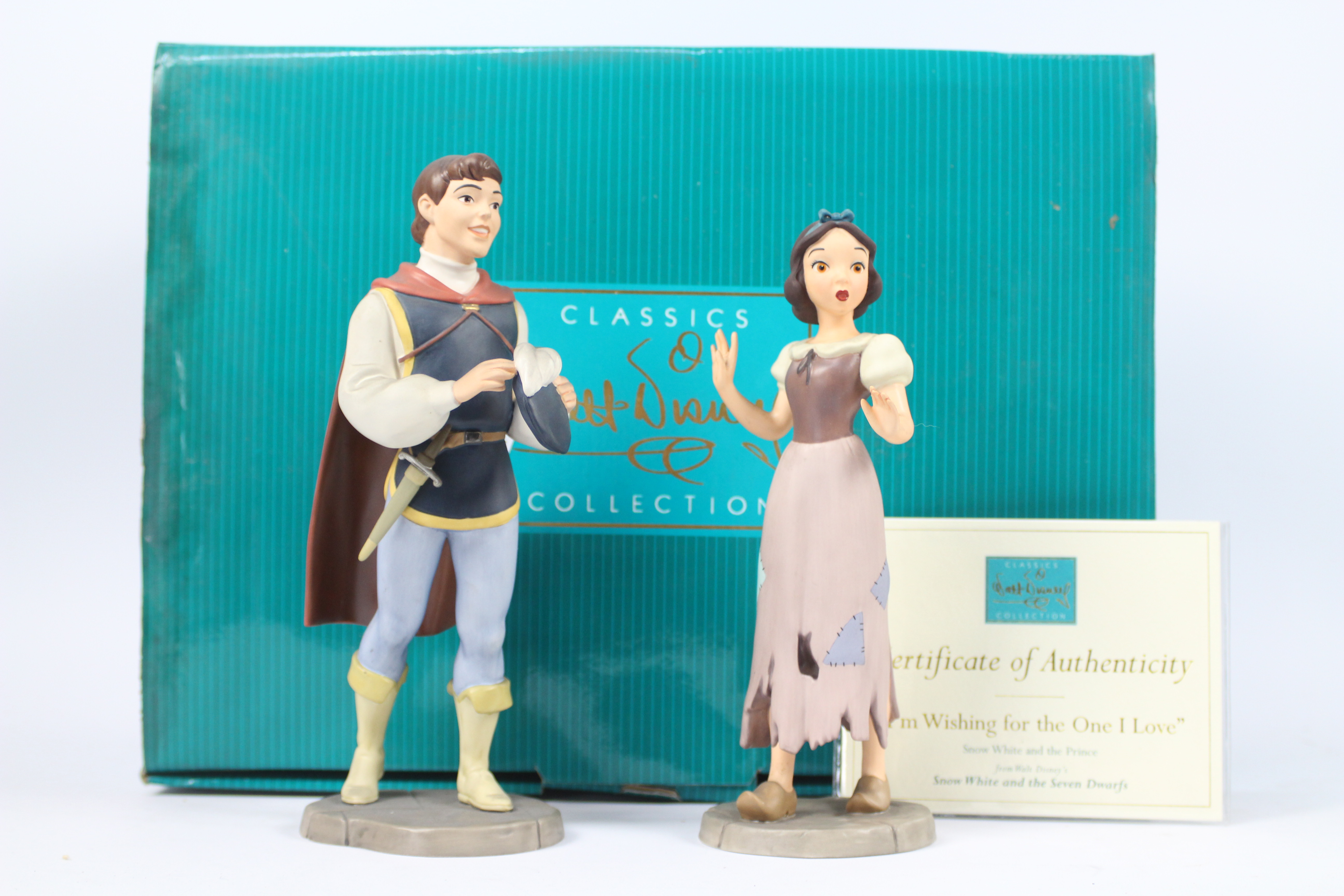 Walt Disney - A boxed Classics Collection pair of figures of Snow White and The Prince from Walt