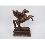 A bronzed cast iron model depicting Pegasus, approximately 34 cm (h).