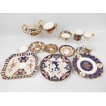 Royal Crown Derby - A collection of various pieces to include paperweight, cups, dishes,