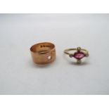 A 9ct rose gold band ring (stone lacking), size N and a stone set ring stamped 9ct, size K+½,