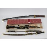 A collection of reproduction Japanese Samurai swords.