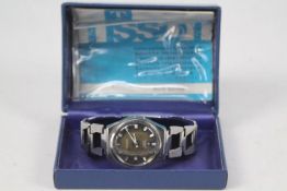 A gentleman's Tissot Seastar wrist watch, contained in original box with paperwork,