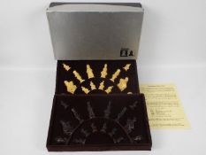 Studio Anne Carlton - An Alice In Wonderland themed chess set with 9cm king,