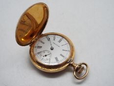 A lady’s 14k gold cased Hunter pocket watch,