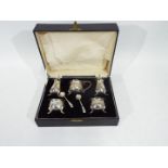 A George V silver cruet set in original fitted case, Birmingham assay 1931 - 1933,