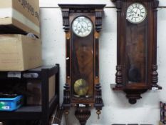 A dark wood Vienna style wall clock,