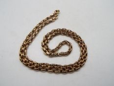 9ct - A rose metal necklace, stamped 9ct, 54 cm (l), approximately 18.6 grams.