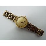 A lady's 9 carat gold cased watch with 9 carat gold bracelet,