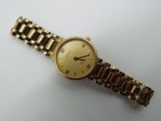 A lady's 9 carat gold cased watch with 9 carat gold bracelet,