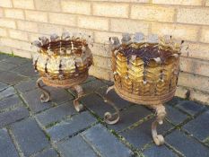 Two gilt, wrought iron, garden planters, largest approximately 36 cm (h).