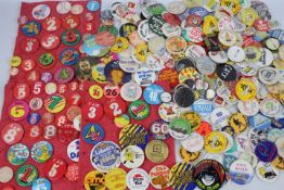 A collection of vintage pin badges to include birthday, advertising / promotional,