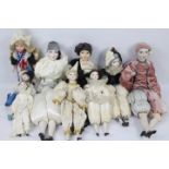 A collection of porcelain / glazed china head dolls,