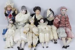 A collection of porcelain / glazed china head dolls,