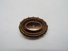 A 9ct gold, stone set, mourning brooch, approximately 6.3 grams all in.