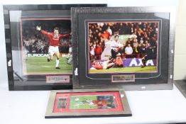 Three framed Manchester United photographic displays bearing signatures to include Teddy Sheringham