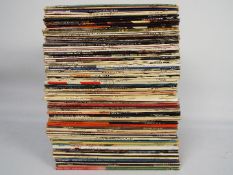 A collection of 12" vinyl records, predominantly jazz / blues to include Louis Armstrong,